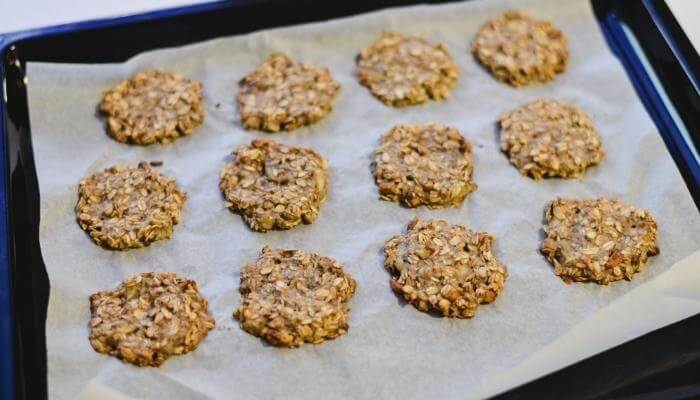 baked oatmeal cookies on parchment paper