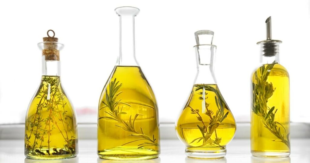 bottles of oils infused with herbs