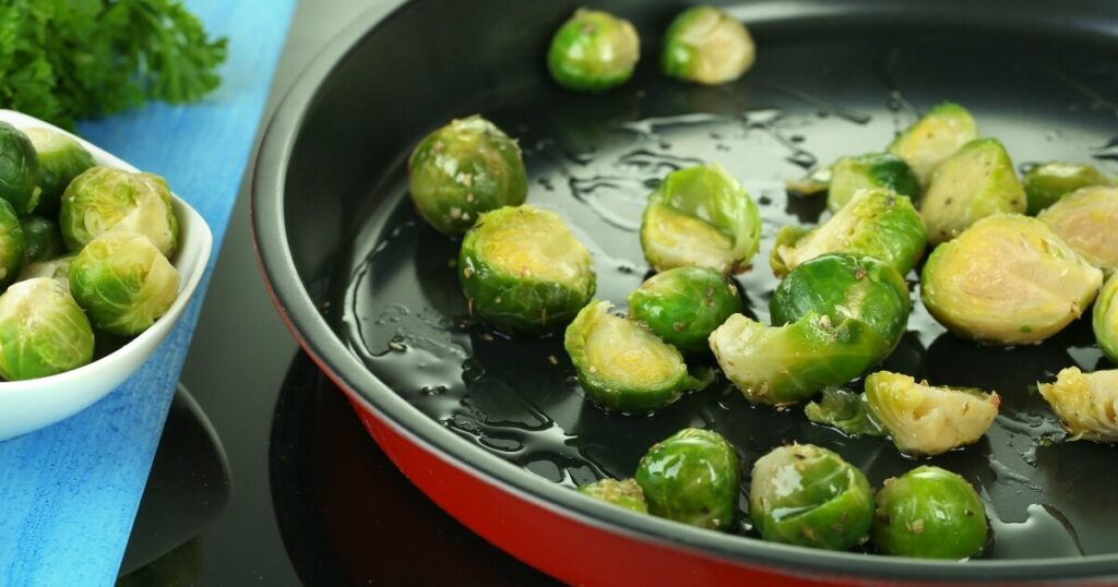 cooking brussels sprouts in oil in saute-pan