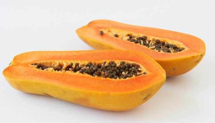 halved ripened papaya