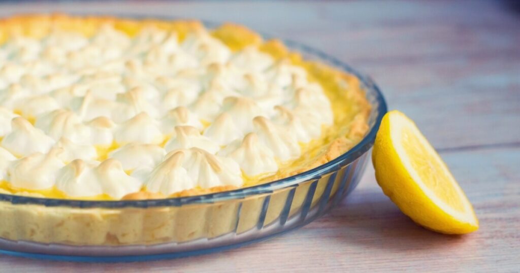 lemon tart in glass pie dish