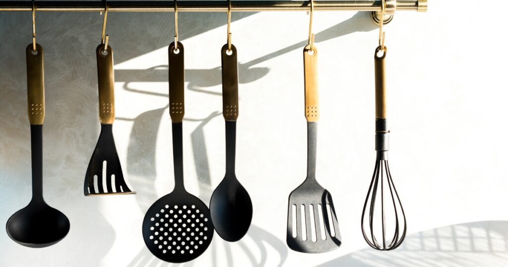 organized cooking utensils hanging