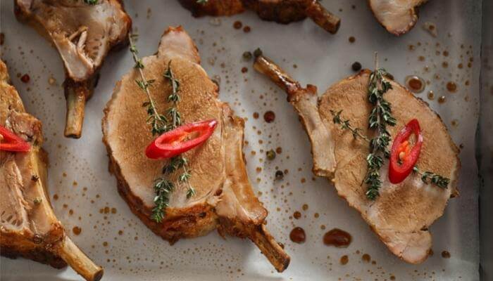 oven roasted pork rib chops on parchment