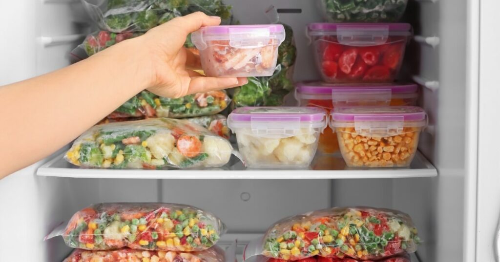 placing container of food in freezer