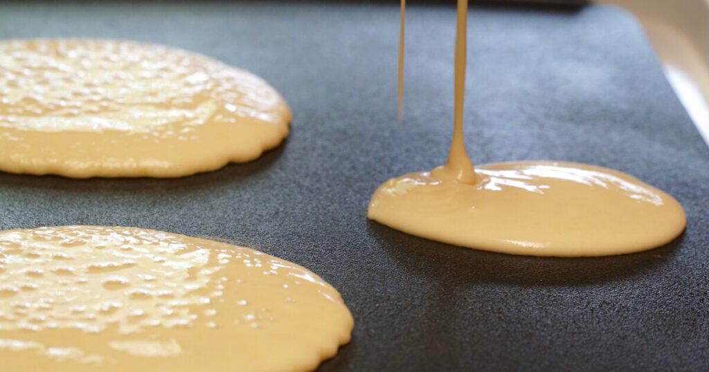 pouring pancake batter