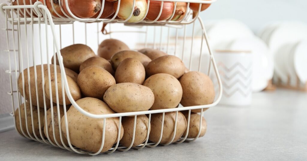 whole potatoes in basket on countertop