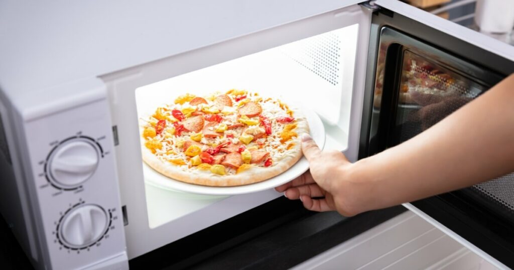 microwaving pizza